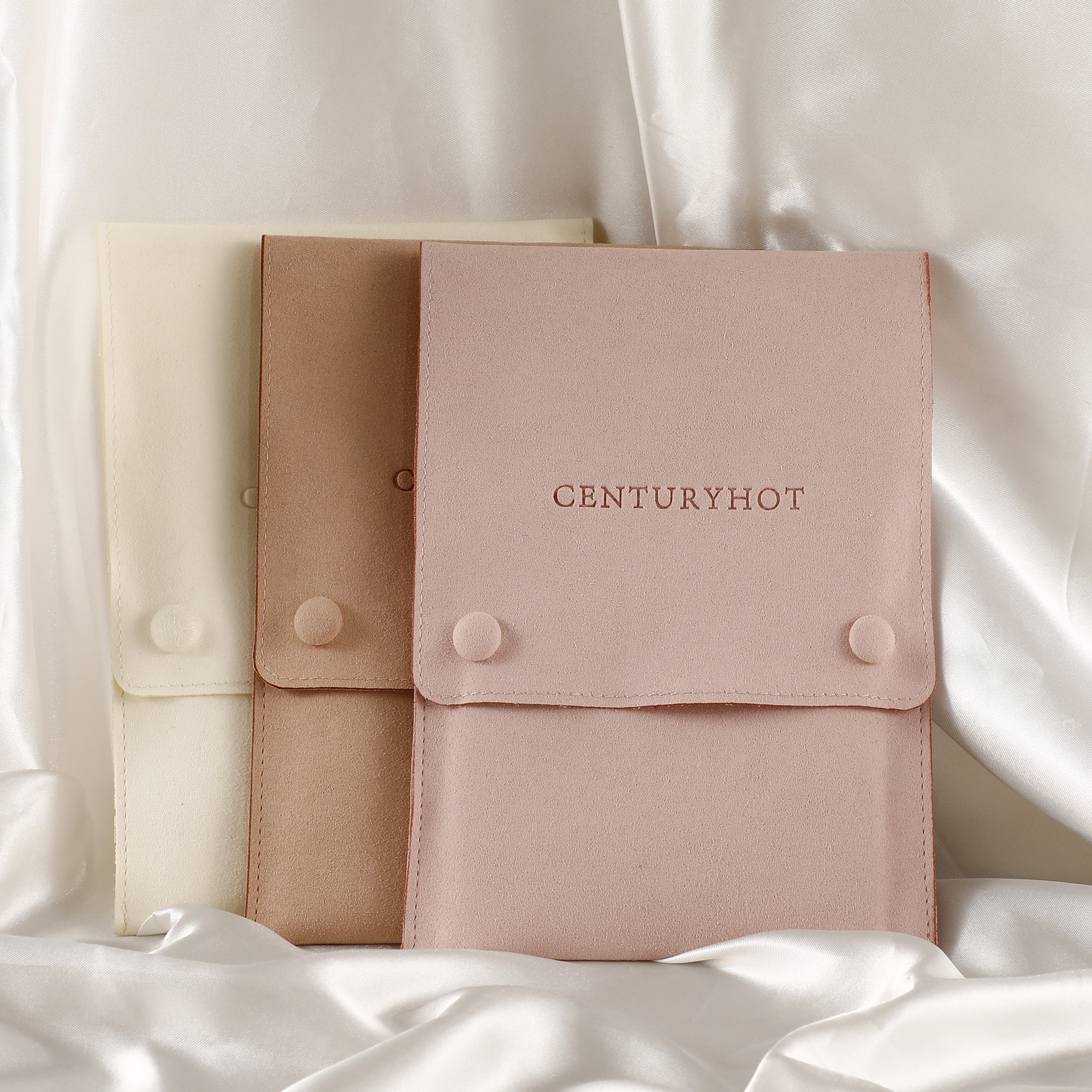 Cream microfiber gift bag with custom logo (colorless relief) for brand branding, suitable for small jewelry brands