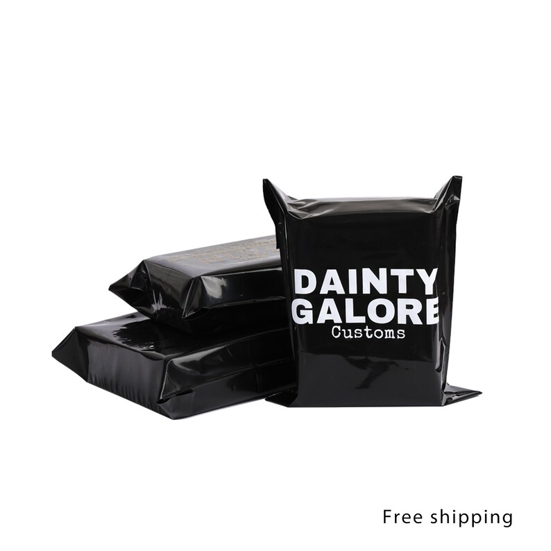 May include: Stack of three black poly mailers with the text "DAINTY GALORE Customs" printed in white on the front of the top mailer.
