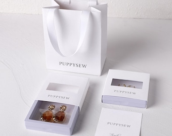 Juego de empaques para joyería con logotipo personalizado / Caja flotante de PE, bolsa de regalo, tarjeta (50 juegos)