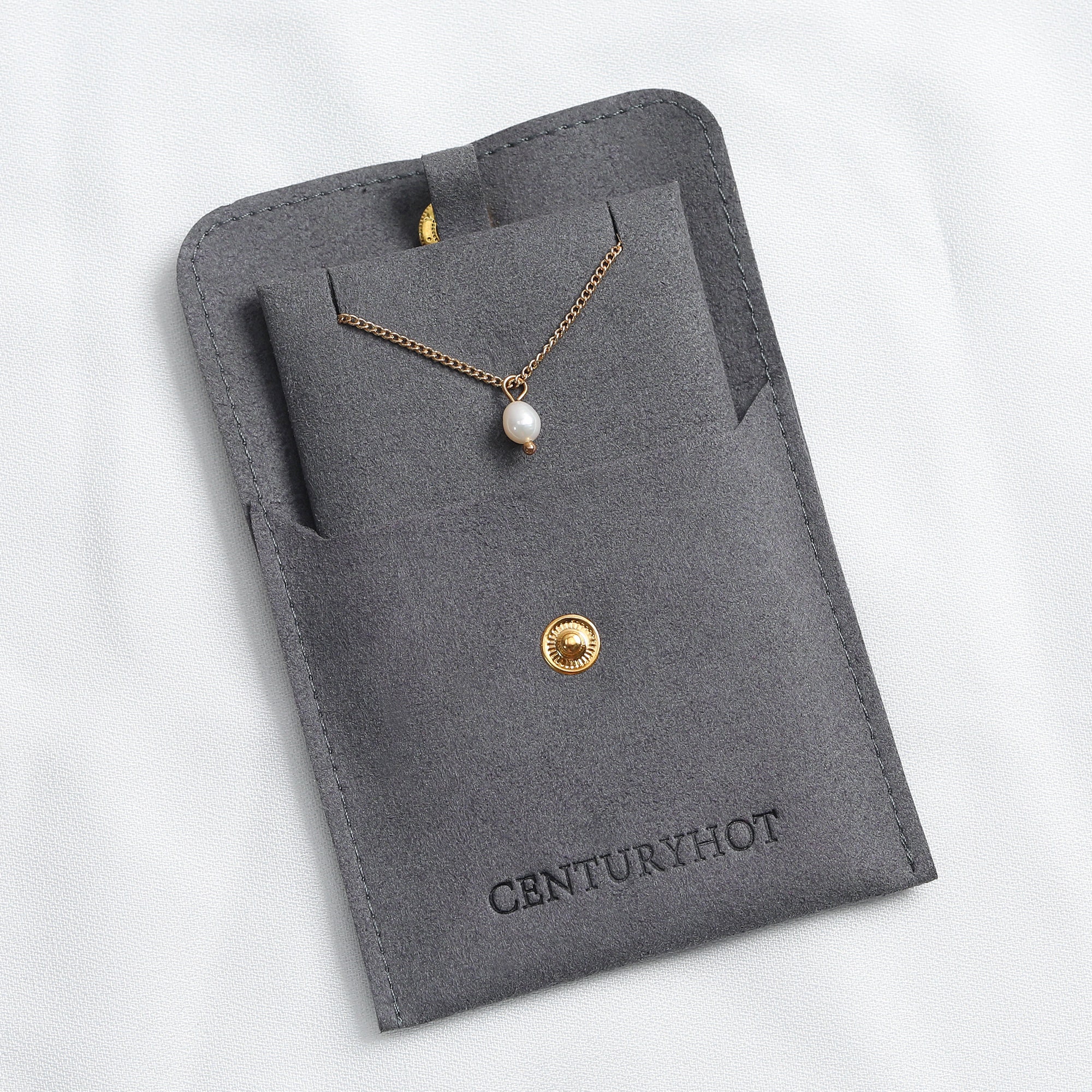 Buying Tips for Button Microfiber Jewelry Bags: Custom logo embossing enhances brand recognition on microfiber jewelry bags