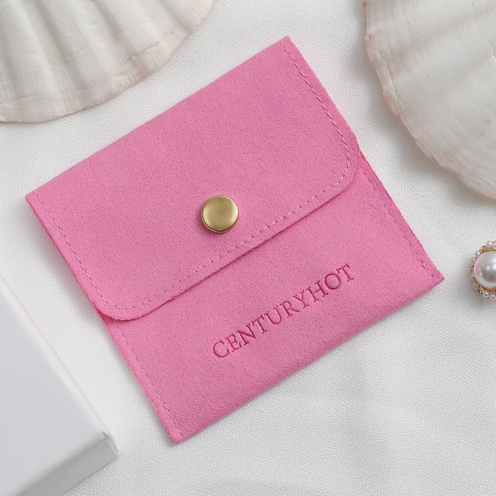 Purple button earring bags made of microfiber, ideal for protecting delicate earrings during storage and shipping