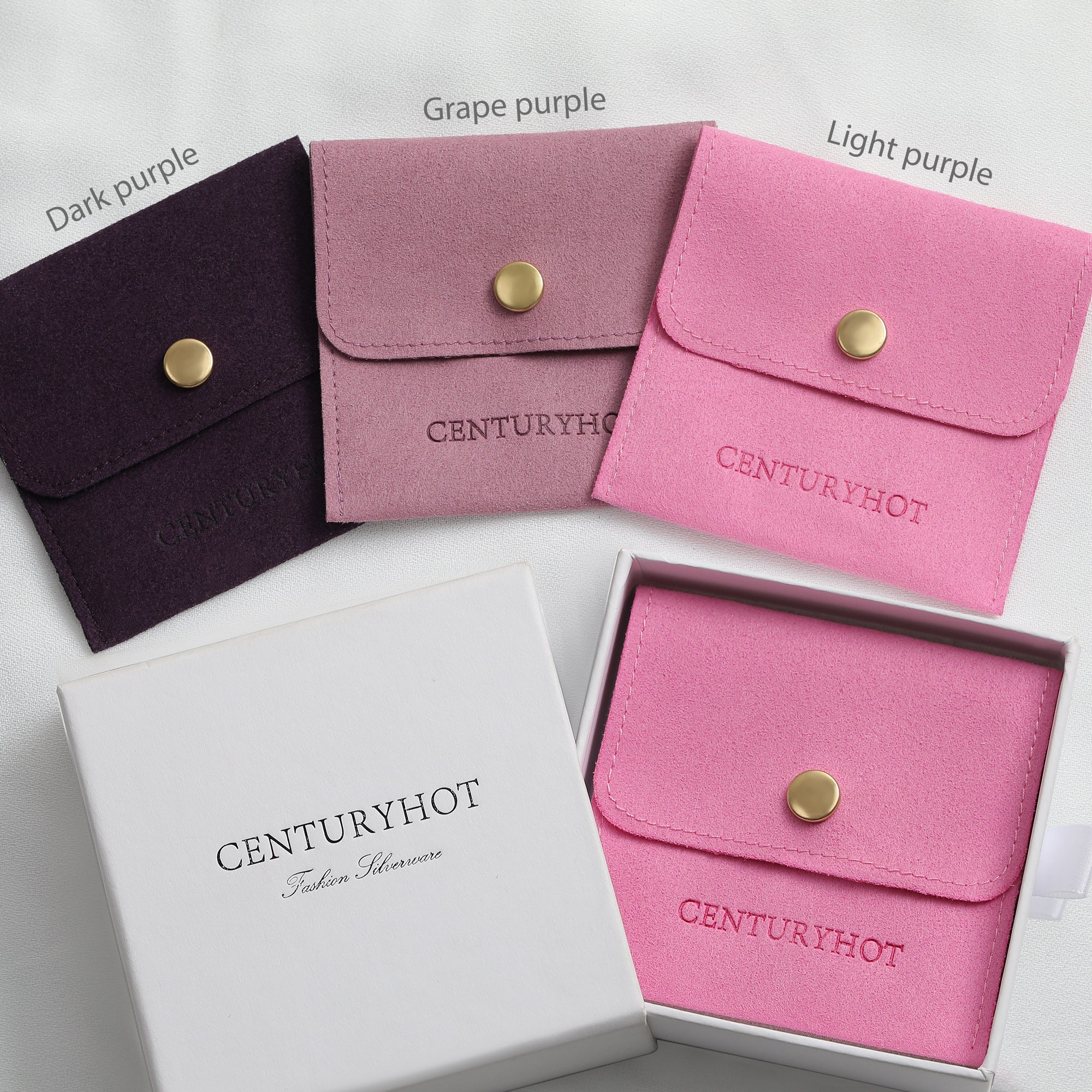Small jewelry brands avoid 50% inventory waste with 50pcs low MOQ purple button bags for earrings