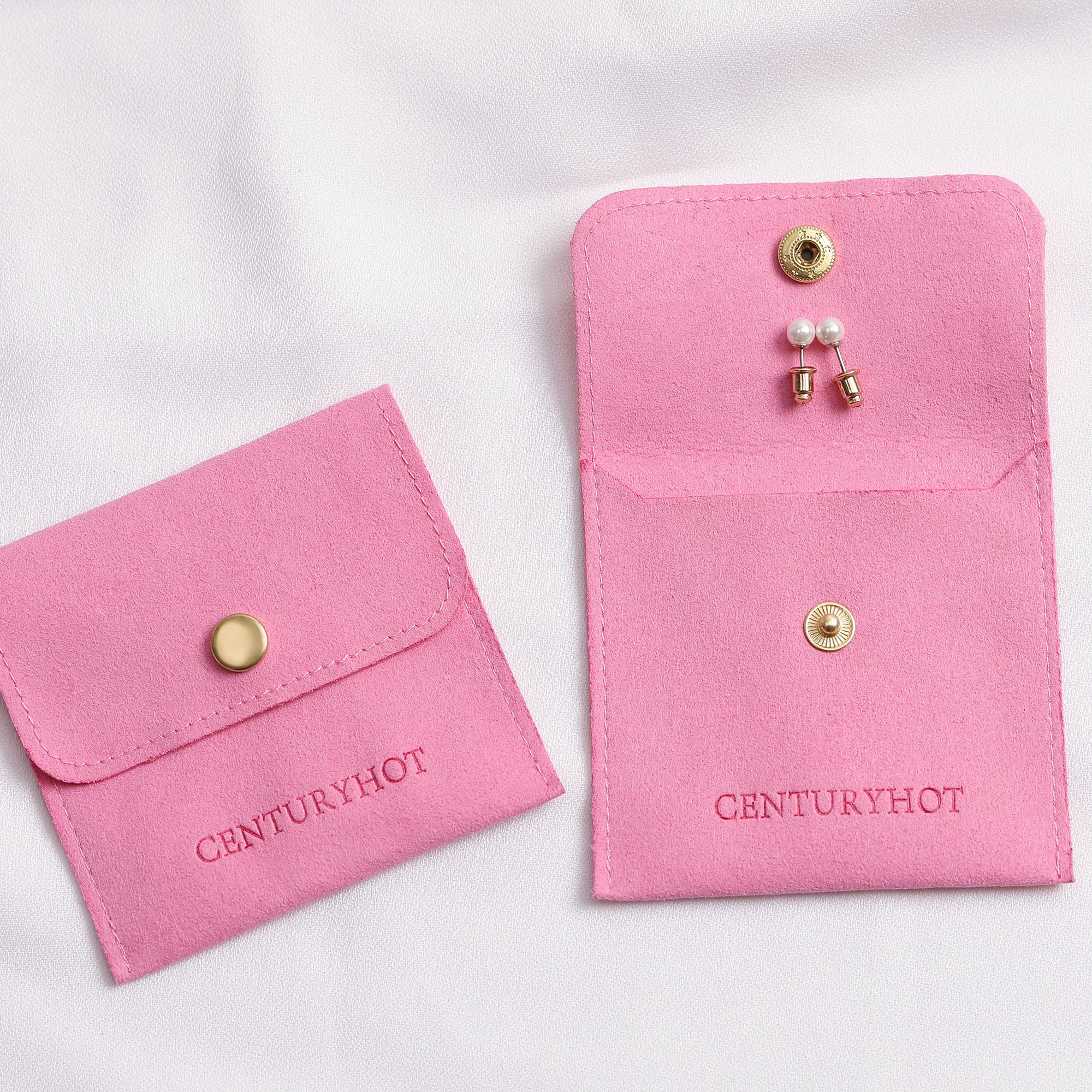 Small jewelry brands reduce inventory waste with 50pcs low MOQ purple microfiber earring bags (MOQ 50, custom logo, button closure) – 60% less overstock (from product introduction)