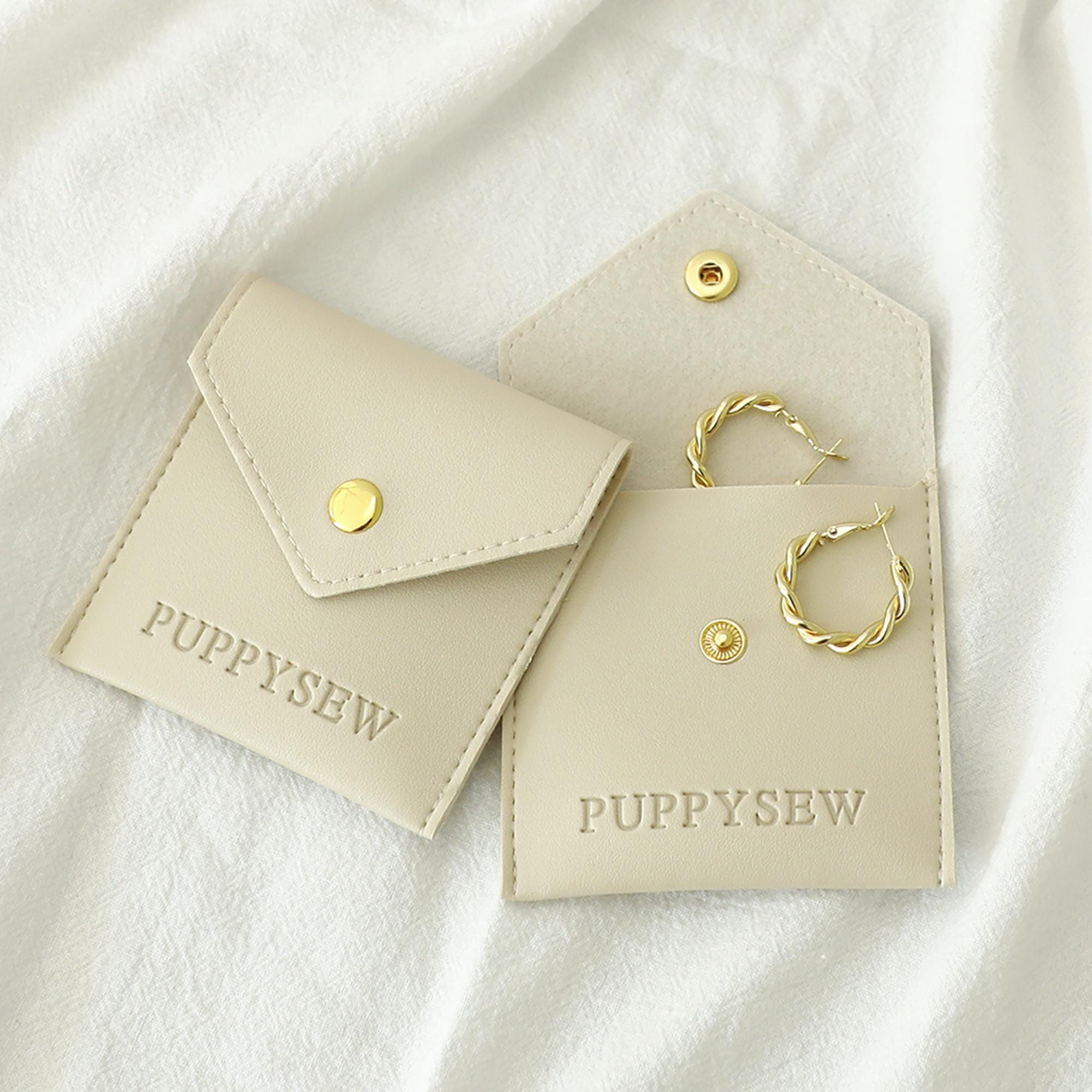 Small jewelry brands' low MOQ packaging solution – 50pcs custom logo faux leather bags, quick 5-7 day production