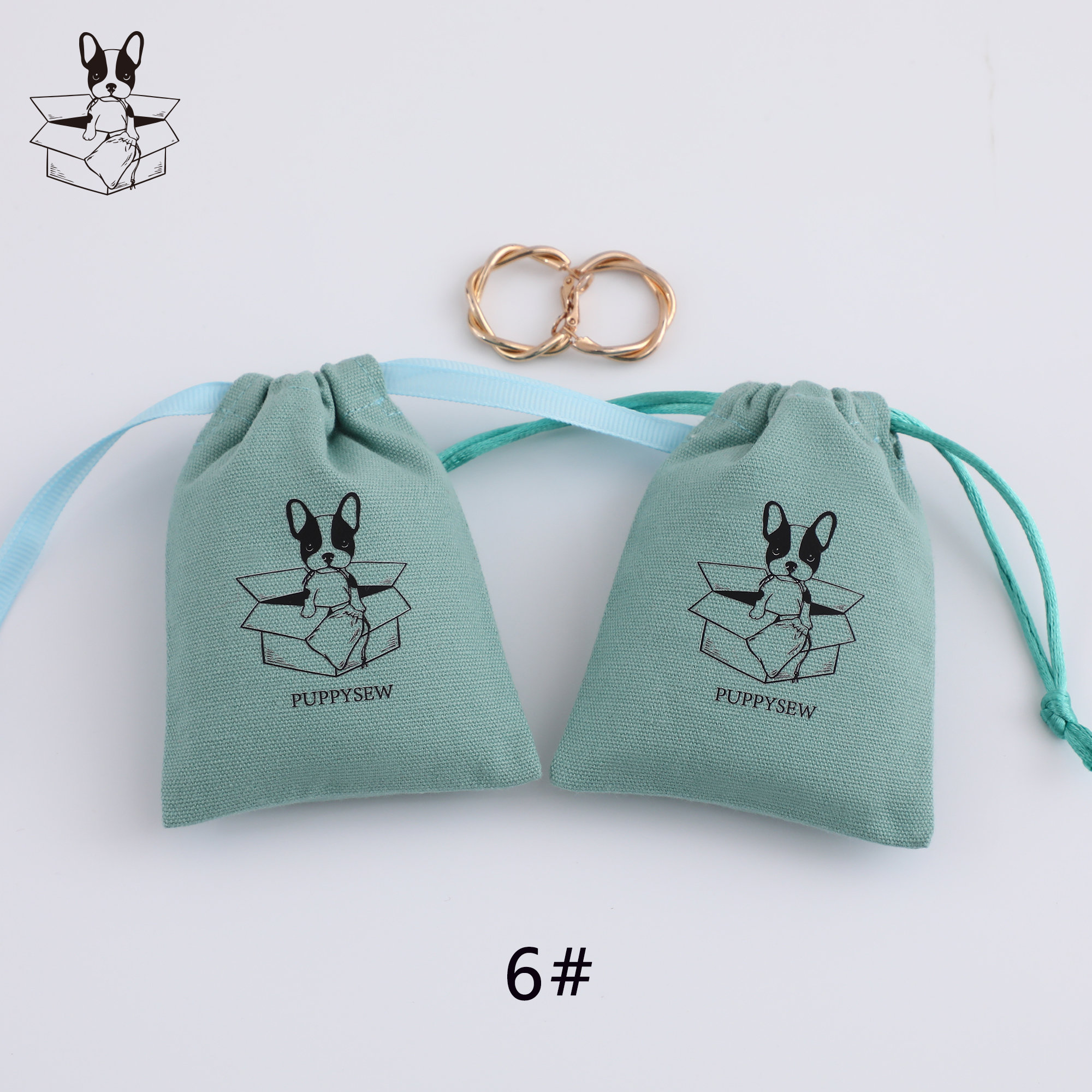 Tips for Choosing Blue Cotton Canvas Ribbon Bags: custom logo printing option to enhance brand visibility on gift bags