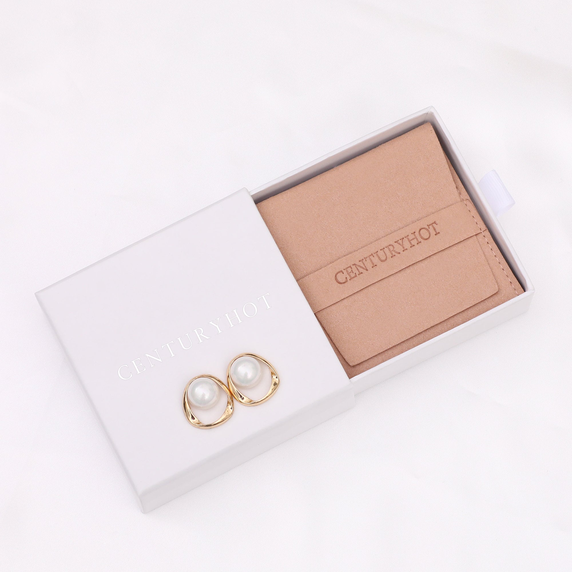 How to Choose Microfiber Envelope Jewelry Pouches: Custom logo example via embossing for brand identity on microfiber pouches