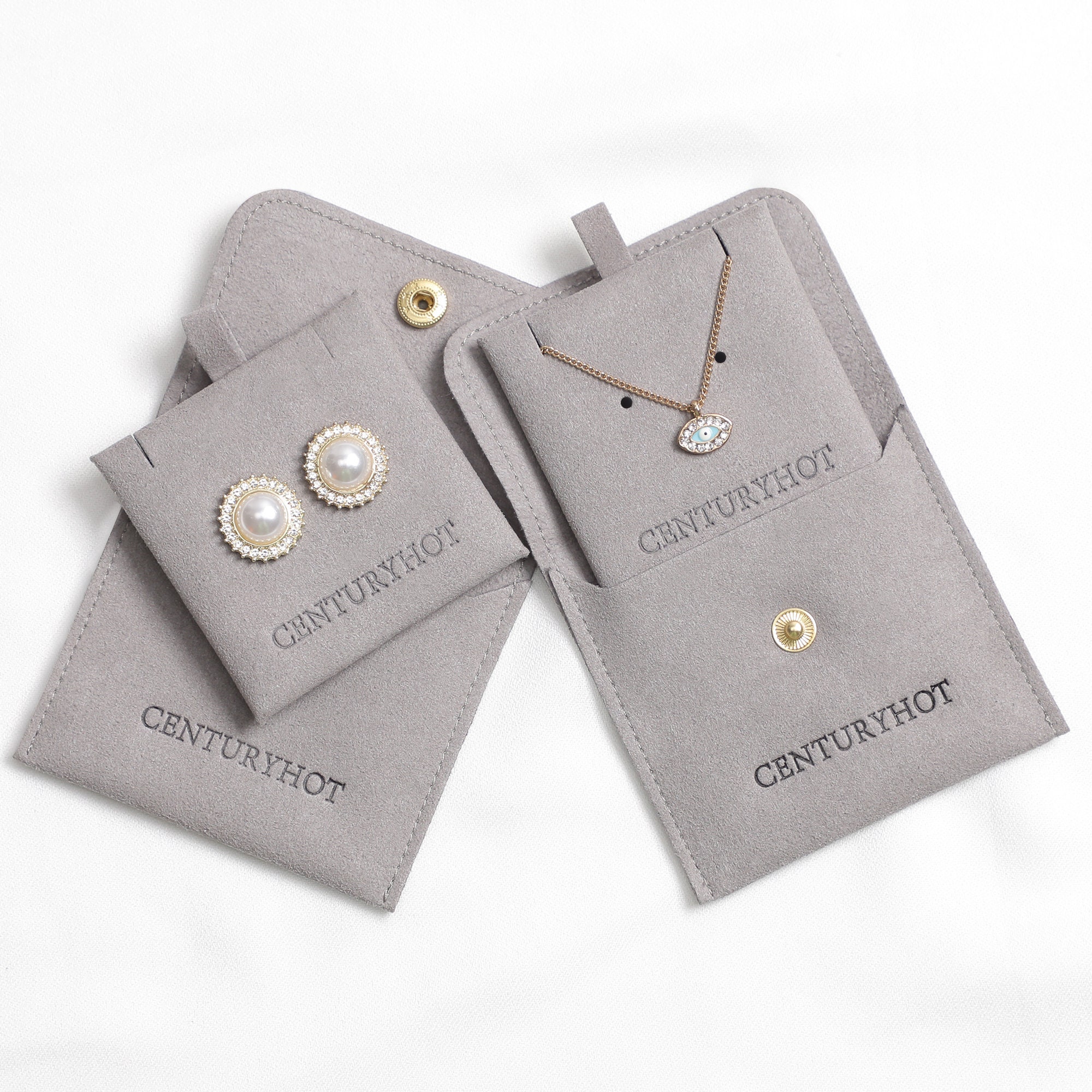 Small jewelry brands protect necklaces with 8×8cm microfiber bags (MOQ 50, 95% less tangling, from product introduction)