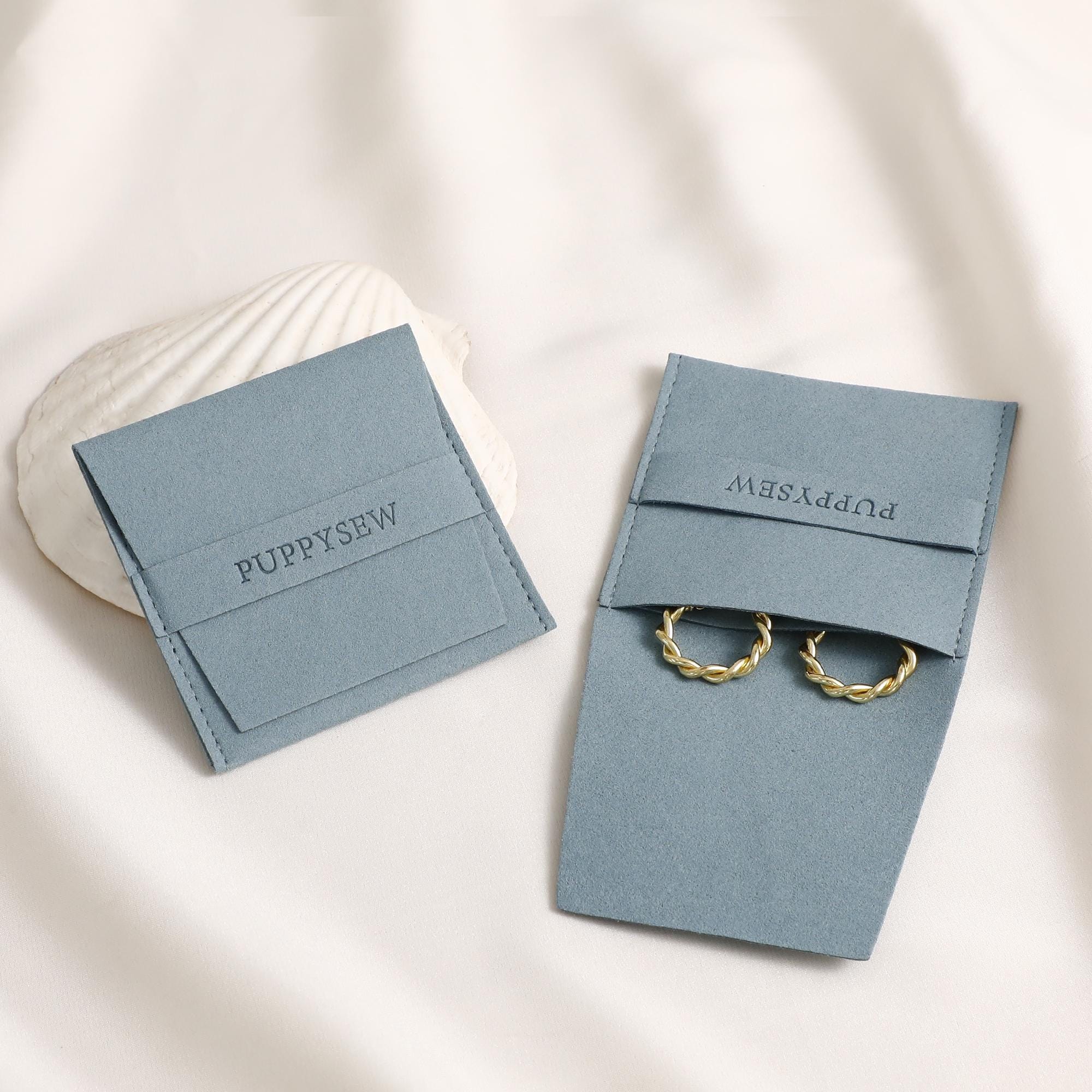 Small jewelry brands boost 80% brand recall with custom debossed logo pouches, solving generic packaging invisibility (from product introduction)