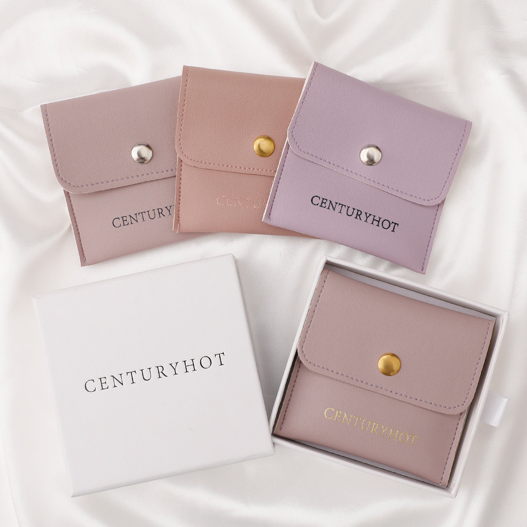 Small jewelry brands solve 'multiple pouches' pain with 50pcs custom logo faux leather bags—multi-use design holds necklaces, rings, coins (8×8cm standard size, custom sizes available)