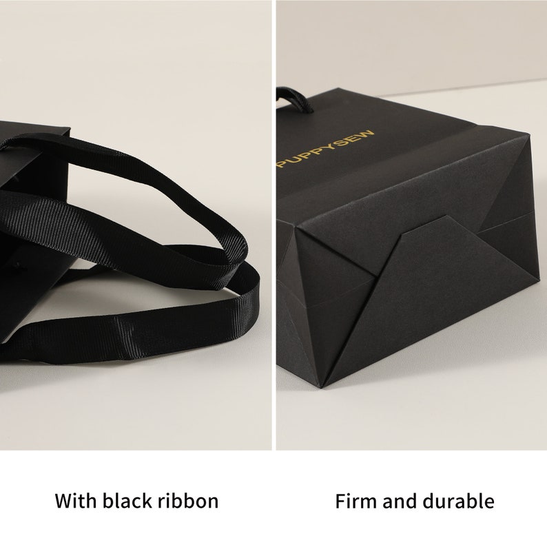 May include: Black paper gift bag with black ribbon handles and gold lettering that says "PUPPYSEW". The bag is firm and durable.