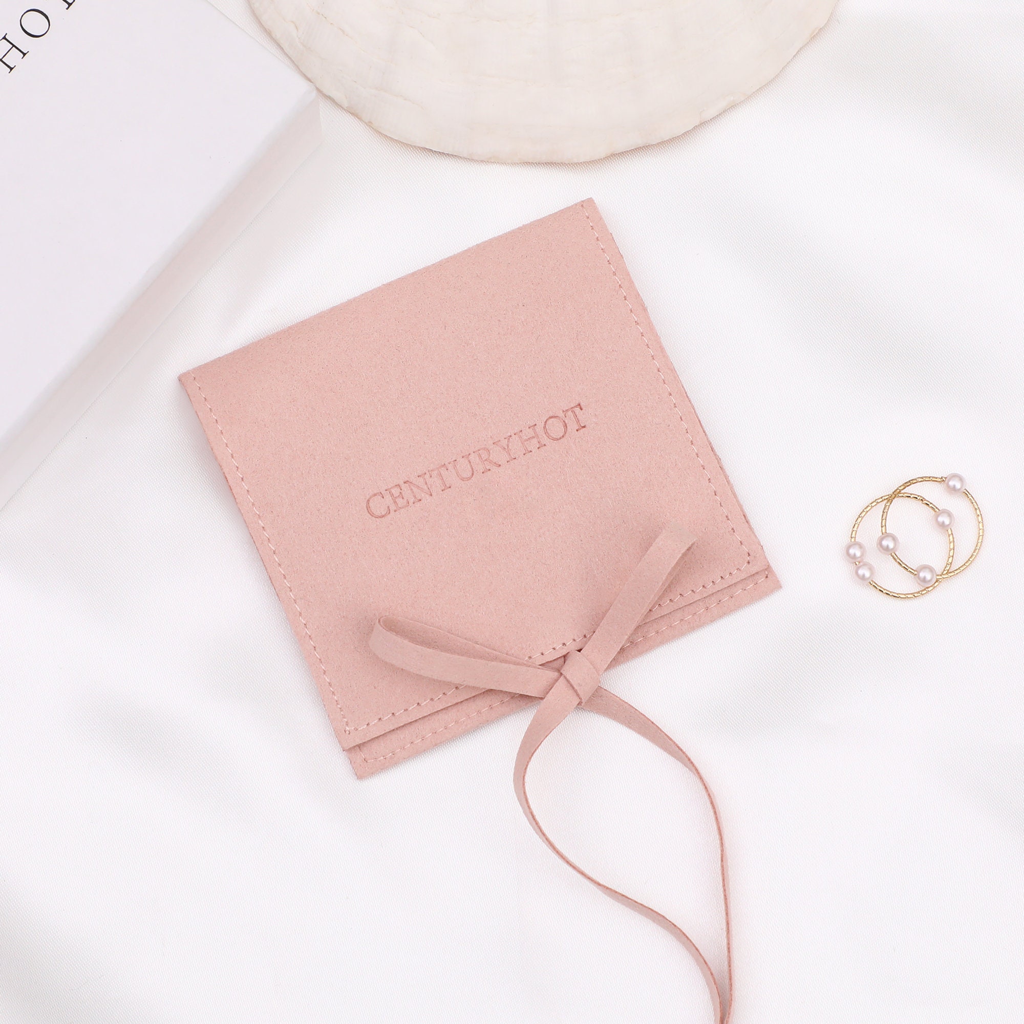 Small jewelry brands reduce inventory waste with 50pcs MOQ microfiber ring bags, fitting 20-30 monthly wedding orders (from product introduction)