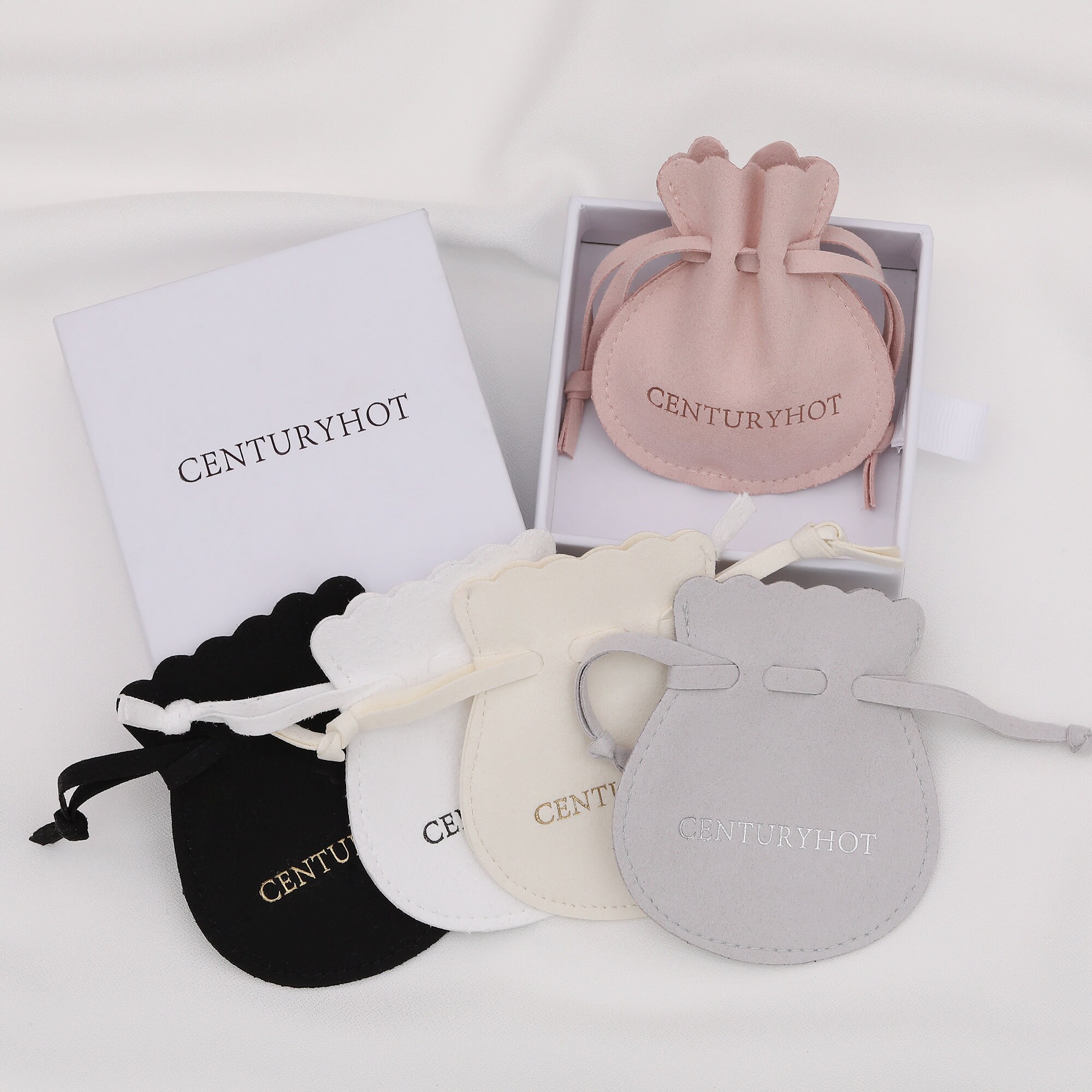 How to Choose Microfiber Drawstring Jewelry Bags: Custom Logo Embossing for Branded Jewelry Packaging
