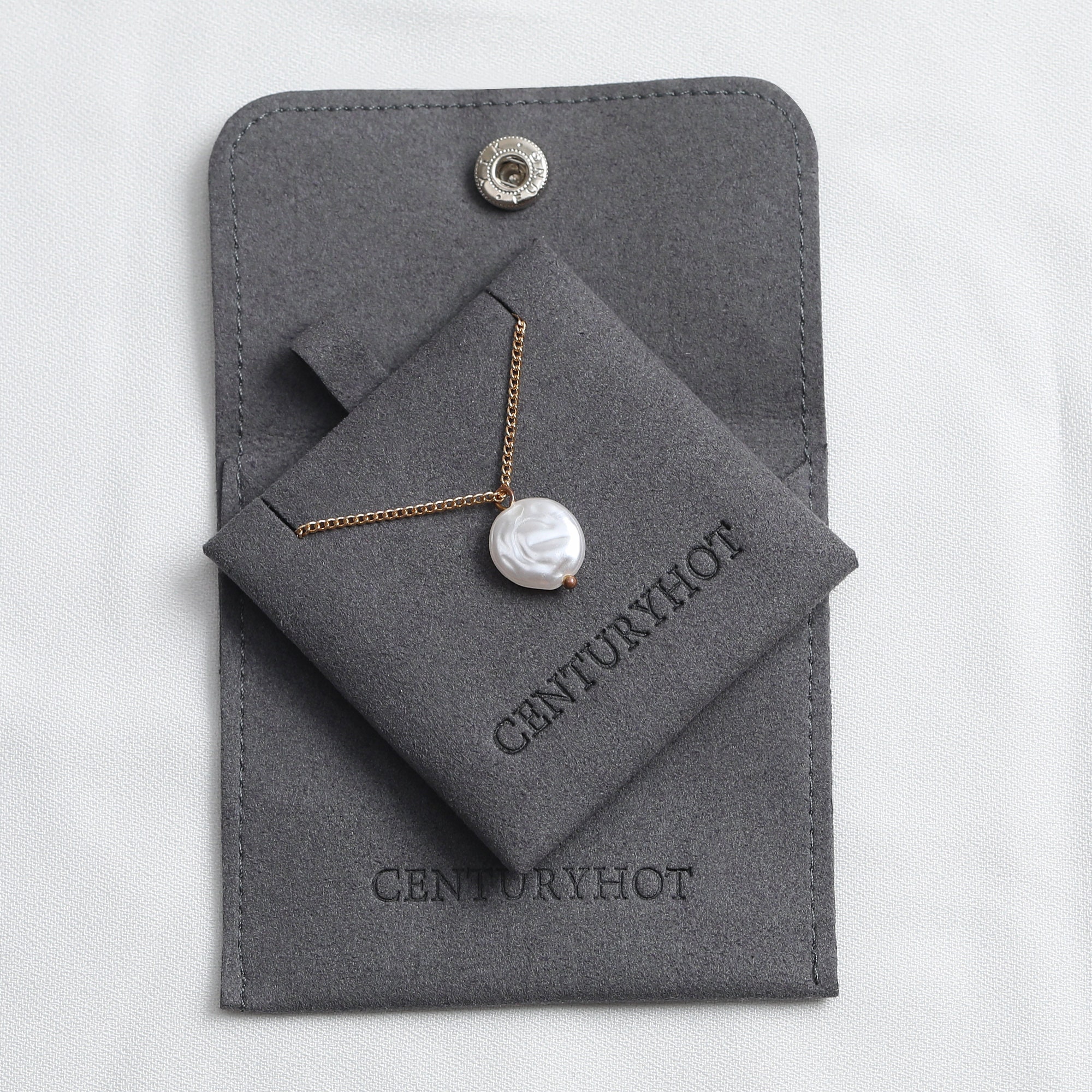 Buying Tips for Button Microfiber Jewelry Bags: Soft microfiber material prevents jewelry scratches during storage and transit