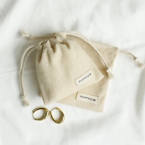 100 étiquettes personnalisables en toile de coton, petit sac de rangement avec étiquette, logo personnalisé, sac d'emballage de bijoux, petit sac à bijoux chic