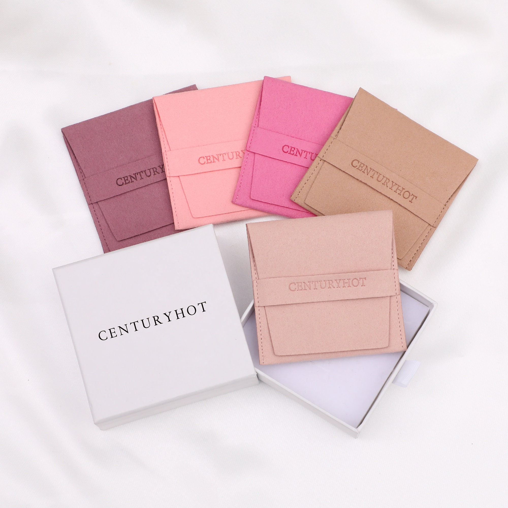 Small jewelry brands solve scratched earrings with 50pcs custom pink microfiber pouches, 30% fewer returns (from product introduction)