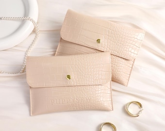 Bolsa de joyería de PU personalizada con logotipo, bolsa con cierre a presión con relieve de imitación de piel de cocodrilo.