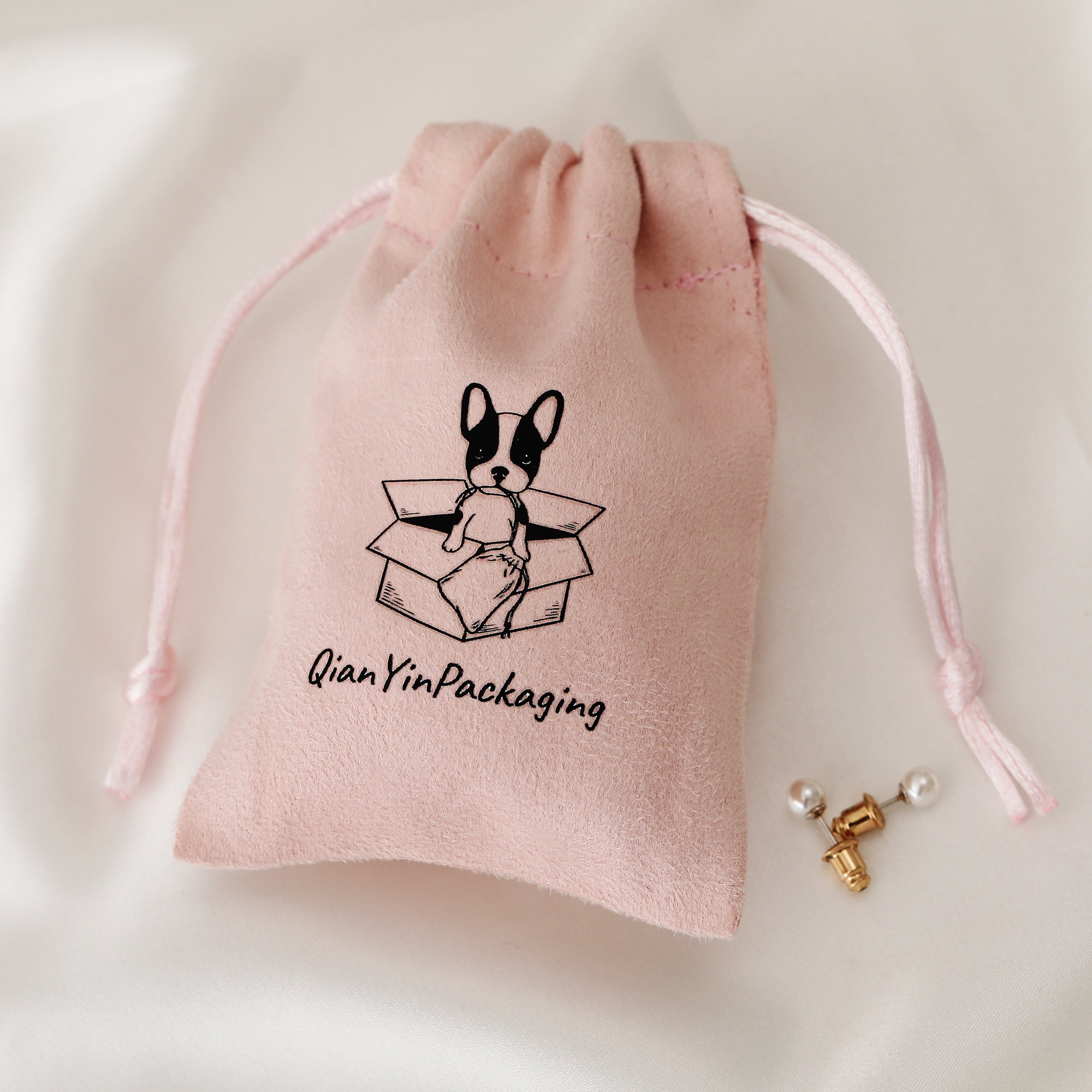 Tips for Choosing Custom Suede Drawstring Bags: custom logo with bronzing finish and size options for necklace storage