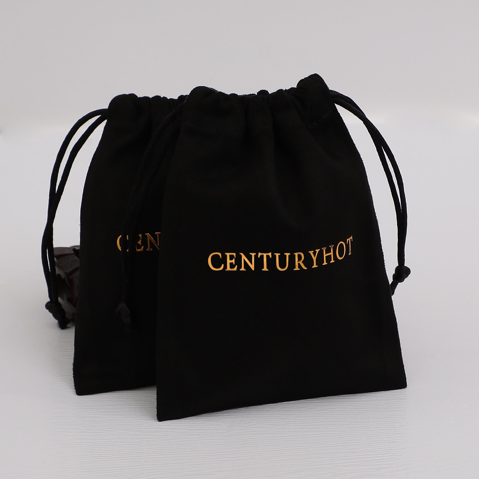 Custom Logo, Pantone Matching: Branded packaging for jewelry brands Flannel drawstring jewel bag with custom logo in pantone-matched color, demonstrating brand alignment for small jewelry businesses