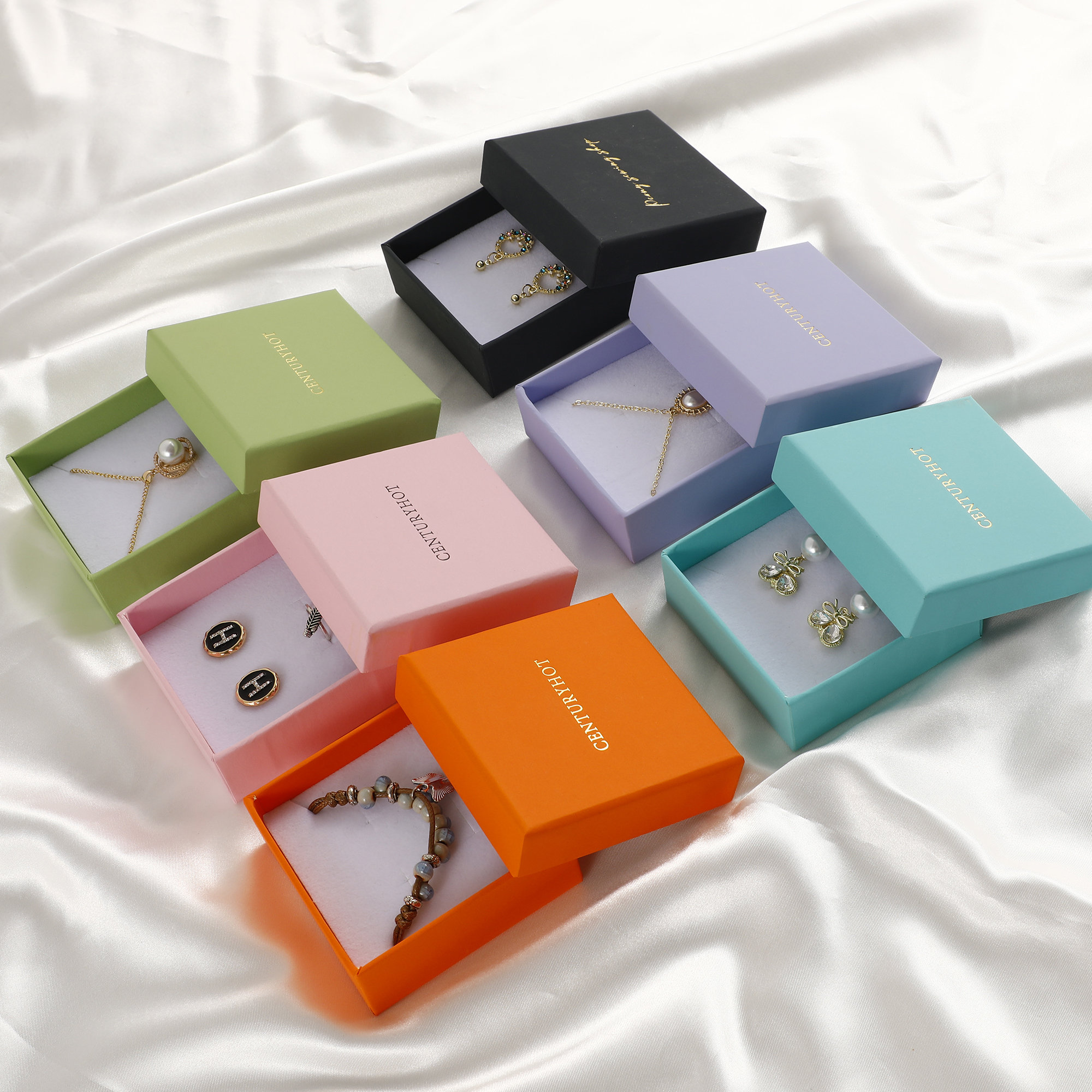 Small jewelry brands prevent 95% of shipping damage with 1200g hard paper carton boxes featuring sponge pads (MOQ 50pcs)