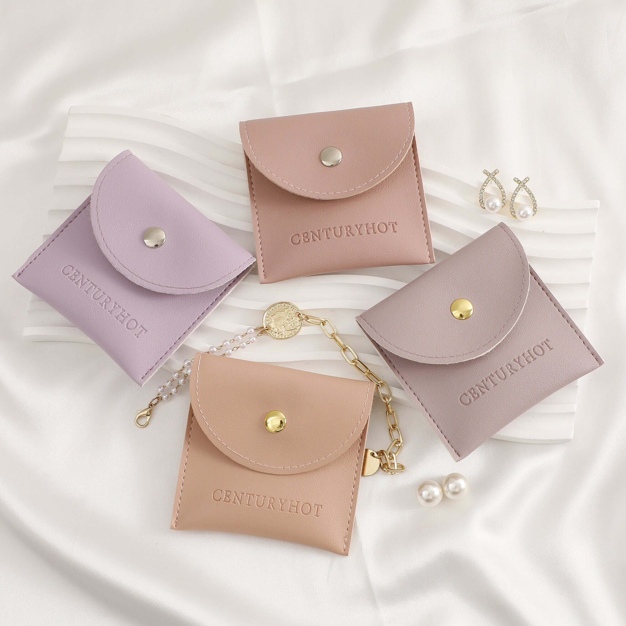 Small jewelry brands prevent jewelry loss with 8x8cm faux leather button bags, 98% secure closure (from product introduction)