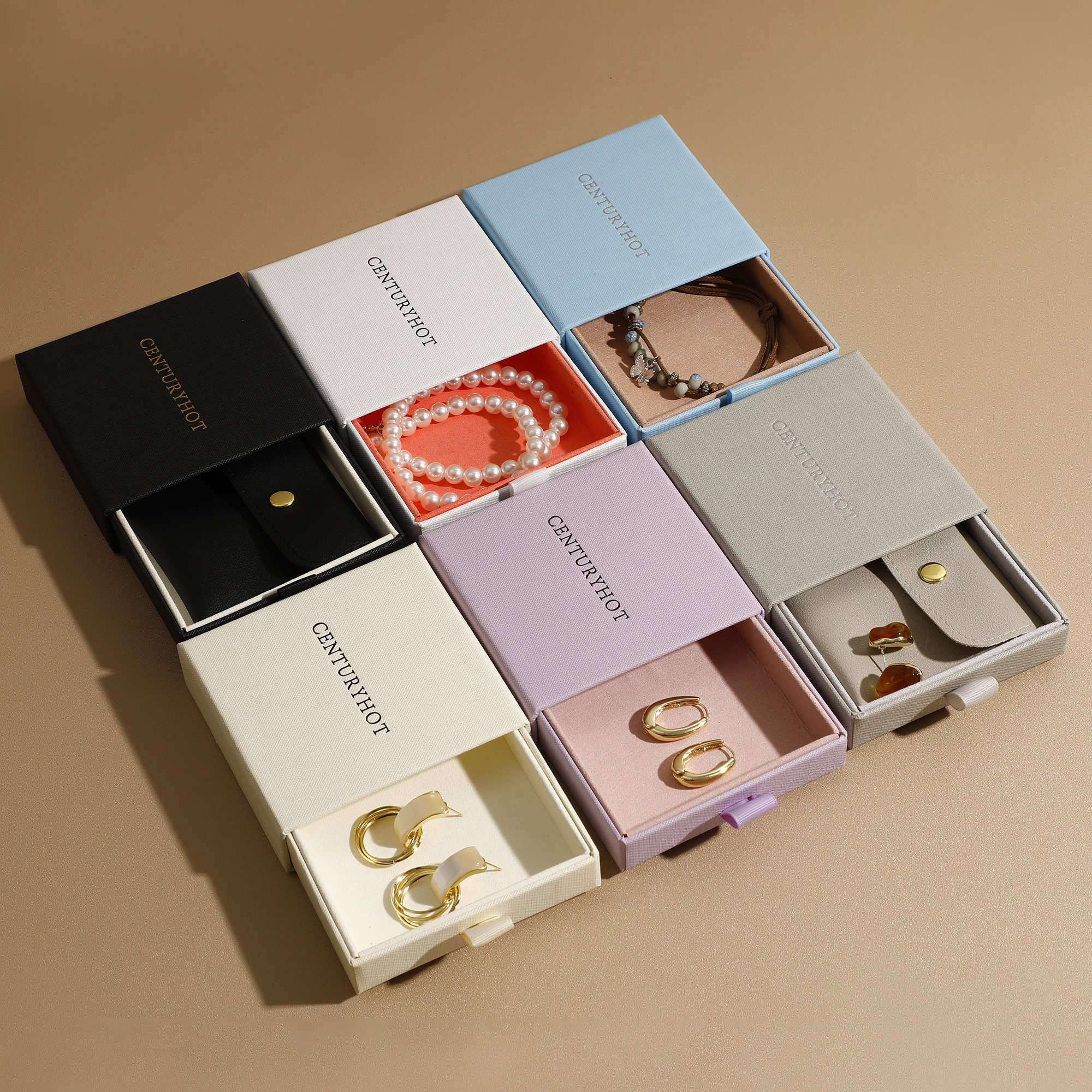 Small jewelry brands solve inventory mess with 9.5×9.5×2.5cm split drawer boxes; 50pcs bulk ensures easy counting and organized storage (production time 5-7 days)