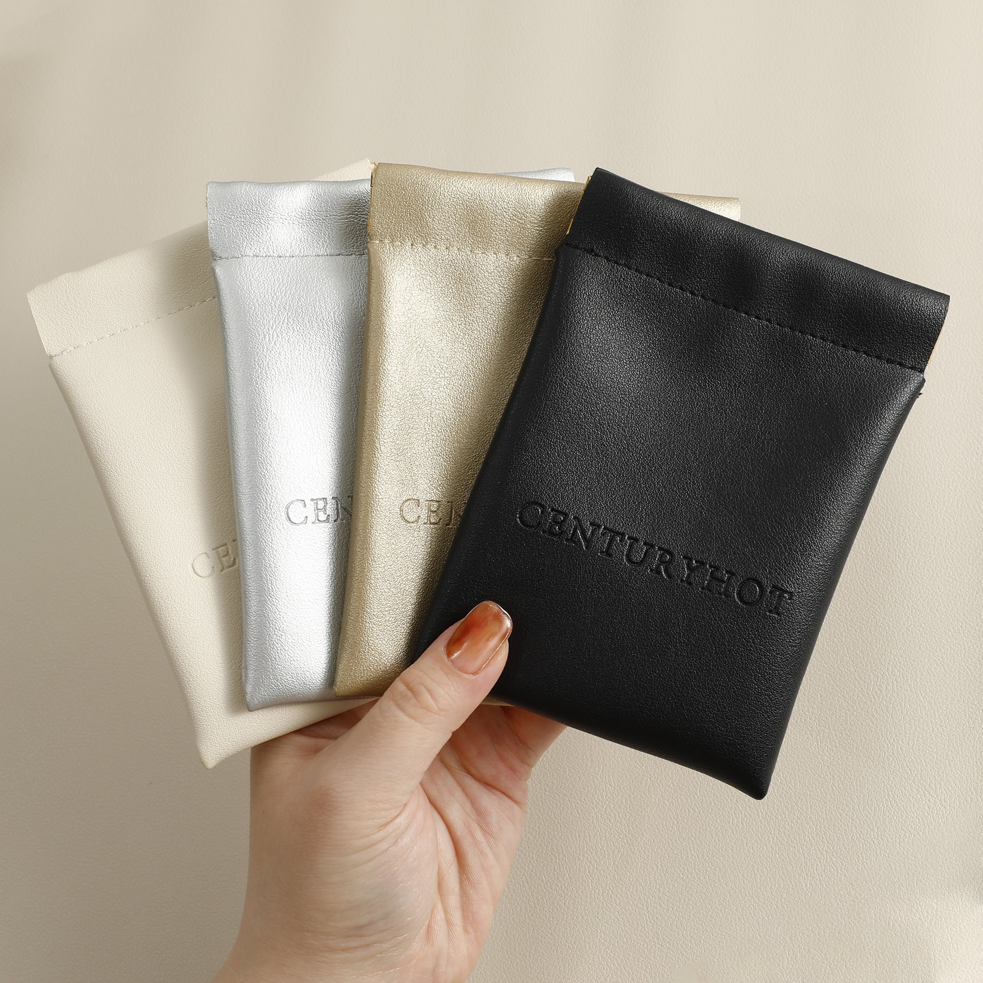 Tips for Choosing Faux Leather Spring Bags: Custom logo embossing and multiple size options for diverse jewelry