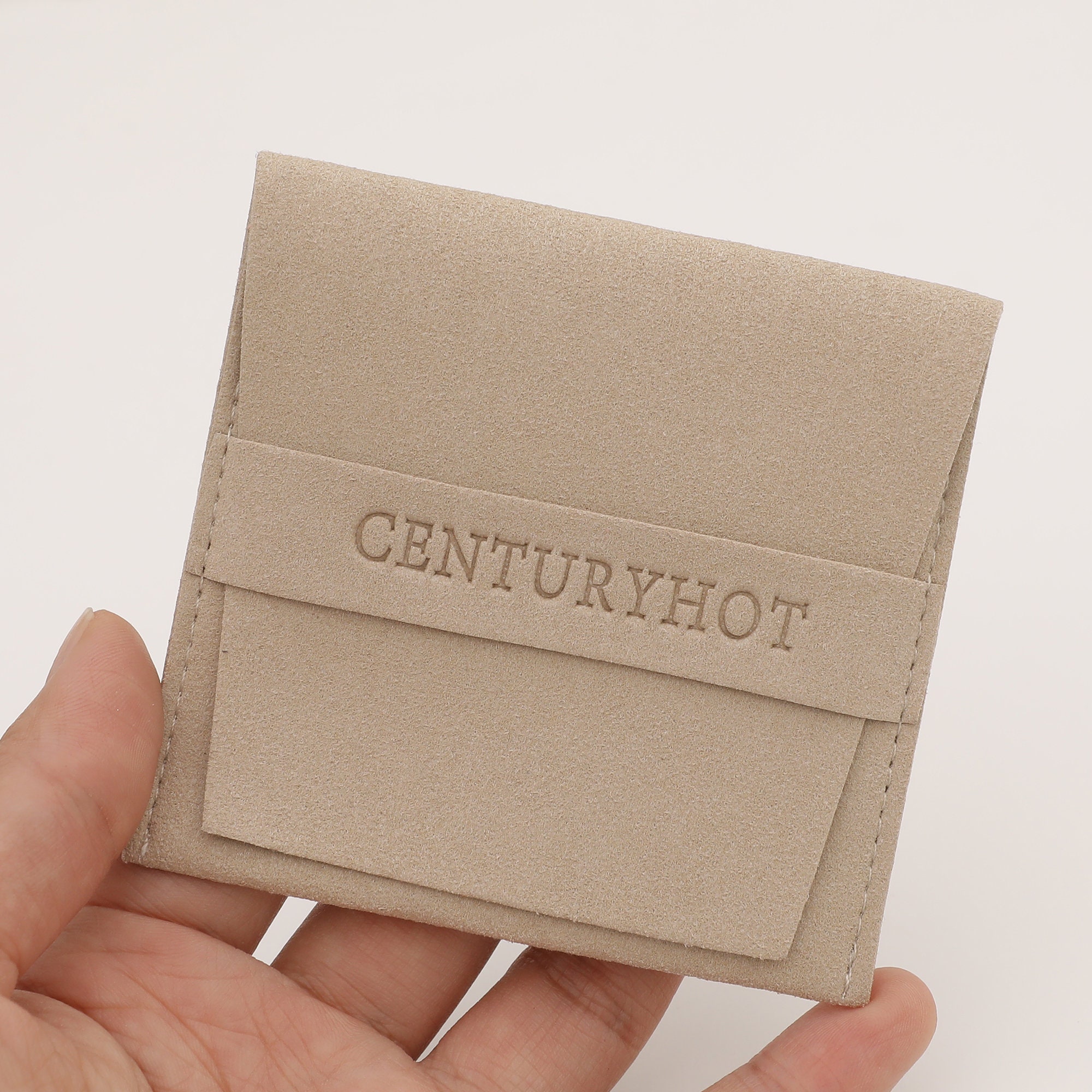 Small jewelry brands solve generic packaging with custom logo microfiber bags (MOQ 50, 40% higher brand recall)