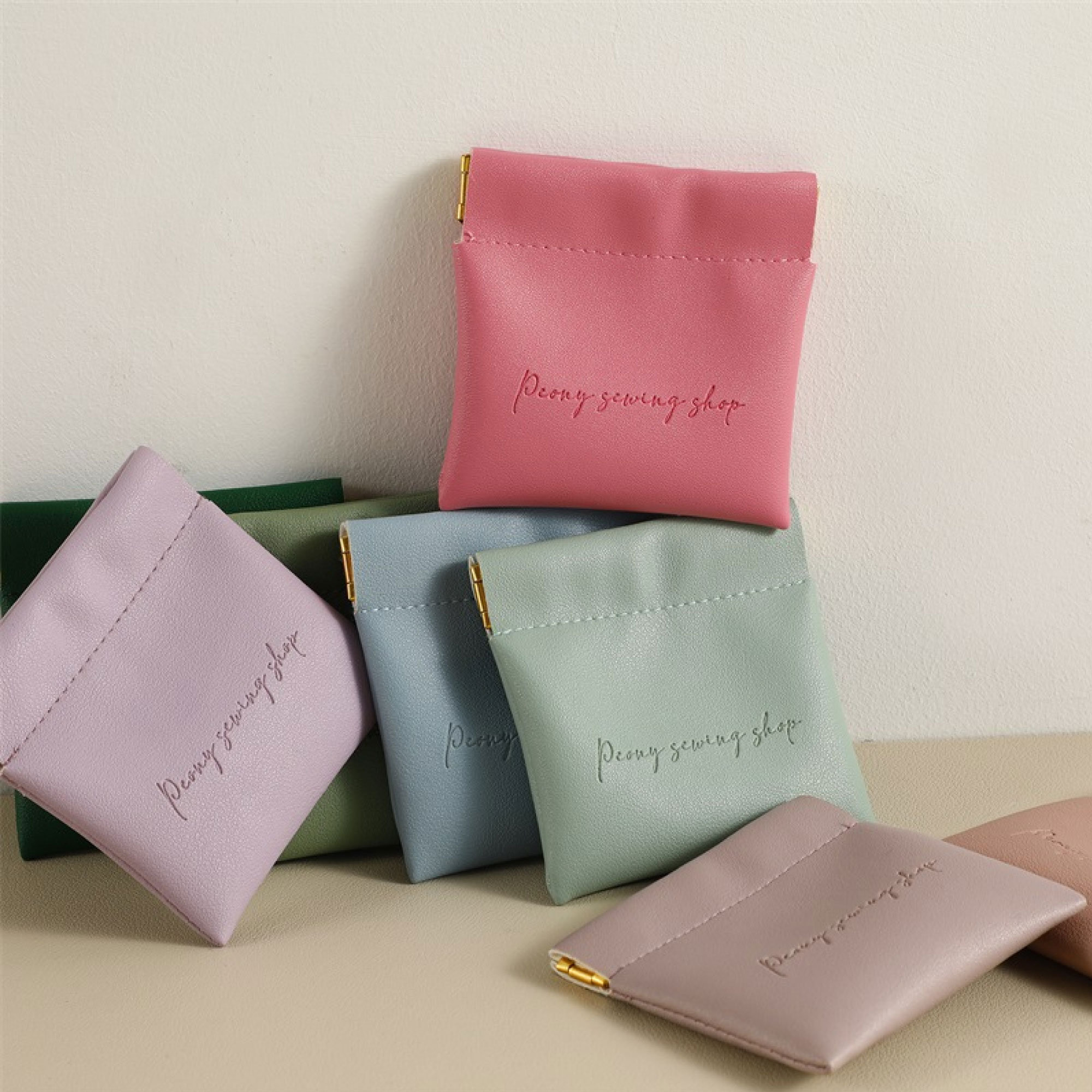 Small jewelry brands: 8×8cm PU leather storage bag with 1.2mm thickness and flannel interior prevents coin damage (from product introduction)