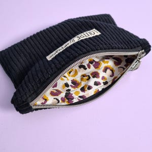 Bolsa de pana negra