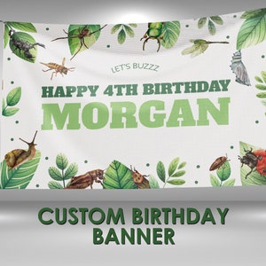 May include: A white birthday banner with green leaves and bugs. The banner says "Let's Buzz Happy 4th Birthday Morgan".