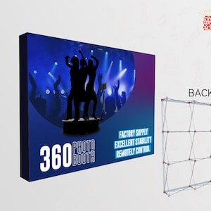 May include: A 360 photo booth with a blue and purple background featuring silhouettes of people dancing. The booth has the words "360 Photo Booth" in white. The back side of the booth is visible, showing a metal frame.