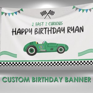 May include: A white banner with a green race car and checkered flag design. The banner says "2 Fast 2 Curious Happy Birthday Ryan" and "Custom Birthday Banner".