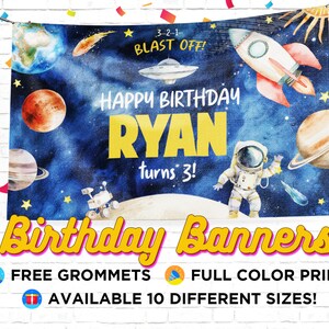 May include: A blue and white birthday banner with a space theme. It features planets, stars, a rocket, a UFO, and an astronaut. The banner says "Happy Birthday Ryan turns 3!" and includes the text "3-2-1 Blast Off!" The banner is available in 10 different sizes and includes free grommets.