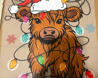 Highland Cow with Christmas Lights! Cute Christmas graphic Tees