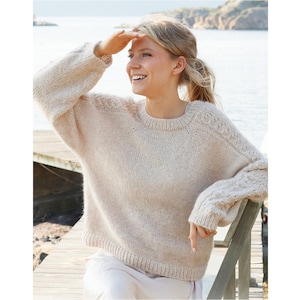 Sweter robiony ręcznie na drutach w 100% z wełny merynosów