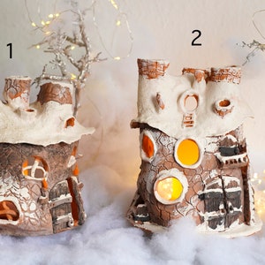 Hand-made house of lights, lantern elf house in the winter village