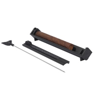 May include: A black cigar cutter with a metal rod and a black plastic case. The cutter is designed to cut cigars to the desired length.