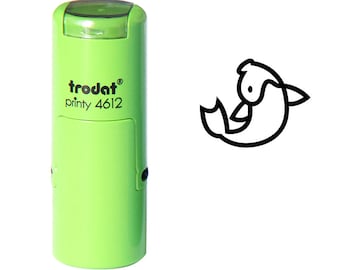 May include: A green Trodat printy 4612 stamp with a black outline drawing of a stylized fish. The stamp has a clear cap and a white background.