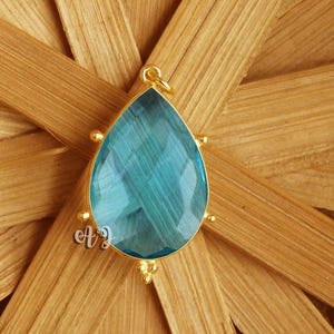 Sky Blue Topaz Hydro Quartz Pear Briolette Brass Setting Gold Plated Tri-dot Bezel Pendant.