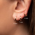 Tiny Huggie Hoop Earrings – 925 Sterling Silver Small Hoops for Everyday Wear – 10mm Minimal Hoop Earrings for Sensitive Ears product logo