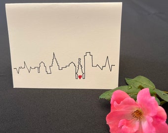Handgjort kort med Philadelphias skyline och präglat hjärta