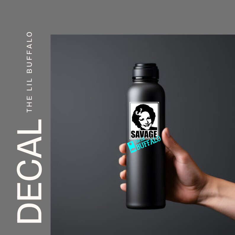 May include: Black water bottle with a white sticker featuring a woman's face and the text "Savage the Lil Buffalo".
