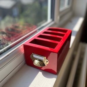 Red British phone box inspired dinner table phone holder
