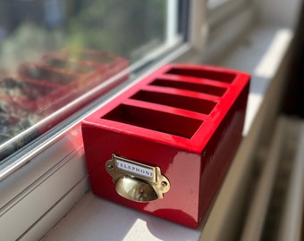 Red British phone box inspired dinner table phone holder