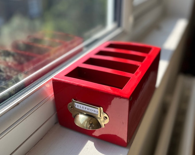 Red British phone box inspired dinner table phone holder