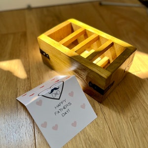 Dinner table phone/remote holder