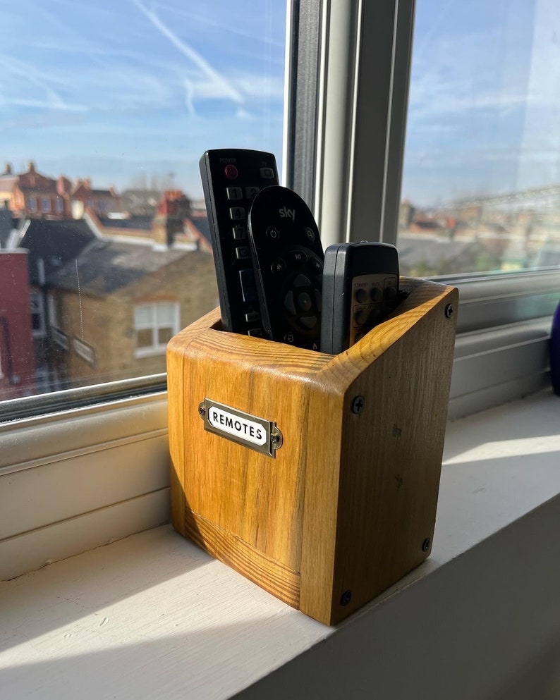 Rustic TV remotes holder image 1