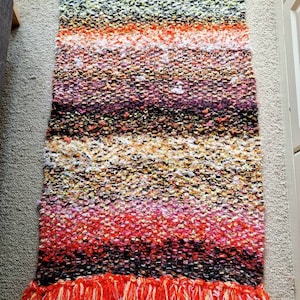 Unique Handknitted, sustainable upcycled rug. Runner rug, orange, purple , fluffy, maximal, Boho, quirky, unique, orange, pink, black, white