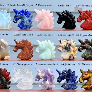 May include: Fifteen unicorn-shaped carvings made from various types of gemstones, including opalite, lapis lazuli jasper, rose quartz, obsidian, mahogany obsidian, sakura agate, red gold sand, amazonite, crazy agate, dragon blood stone, blood stone, clear quartz, dream amethyst, sodalite, and tiger's-eye jasper.