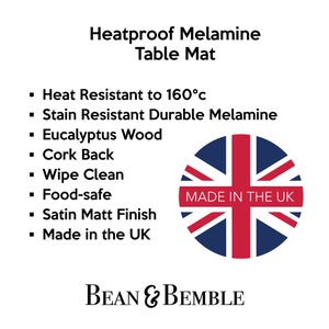 May include: Heatproof melamine table mat with a cork back and a satin matt finish. It is heat resistant to 160 degrees Celsius, stain resistant, food-safe, and wipe clean. The mat is made in the UK and features a red, white, and blue Union Jack design with the text "MADE IN THE UK".